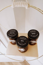 Load image into Gallery viewer, Southern candles in Campfire, Leaves, and Skinny Dip scents
